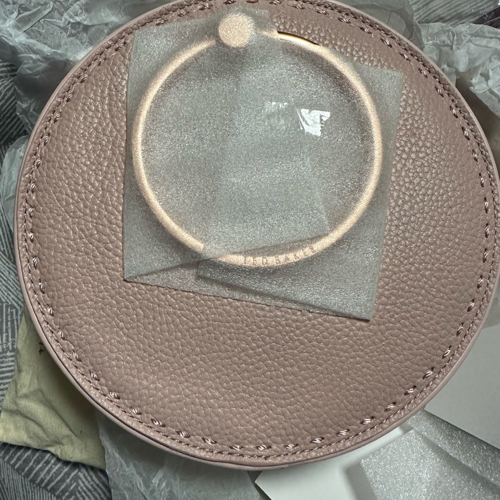 Ted Baker London Round Pink cross body bag.